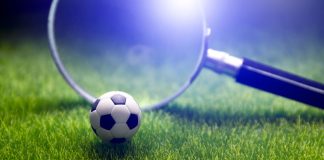 Sportradar refuerza su acuerdo de monitoreo con la CBF Una lupa observa una pelota de fútbol.