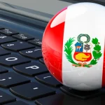 Perú permite la venta de loterías en más comercios bandera de perú sobre teclado