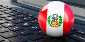 Perú permite la venta de loterías en más comercios bandera de perú sobre teclado