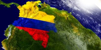 Colombia: Reforzarán los monitoreos a las loterías a partir del caso de Medellín colombia y su bandera, vista panorámica