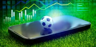 Brasil confirma la estructura del Sistema Nacional de Apuestas (SINAPO) sinapo, celular con pelota de fútbol arriba